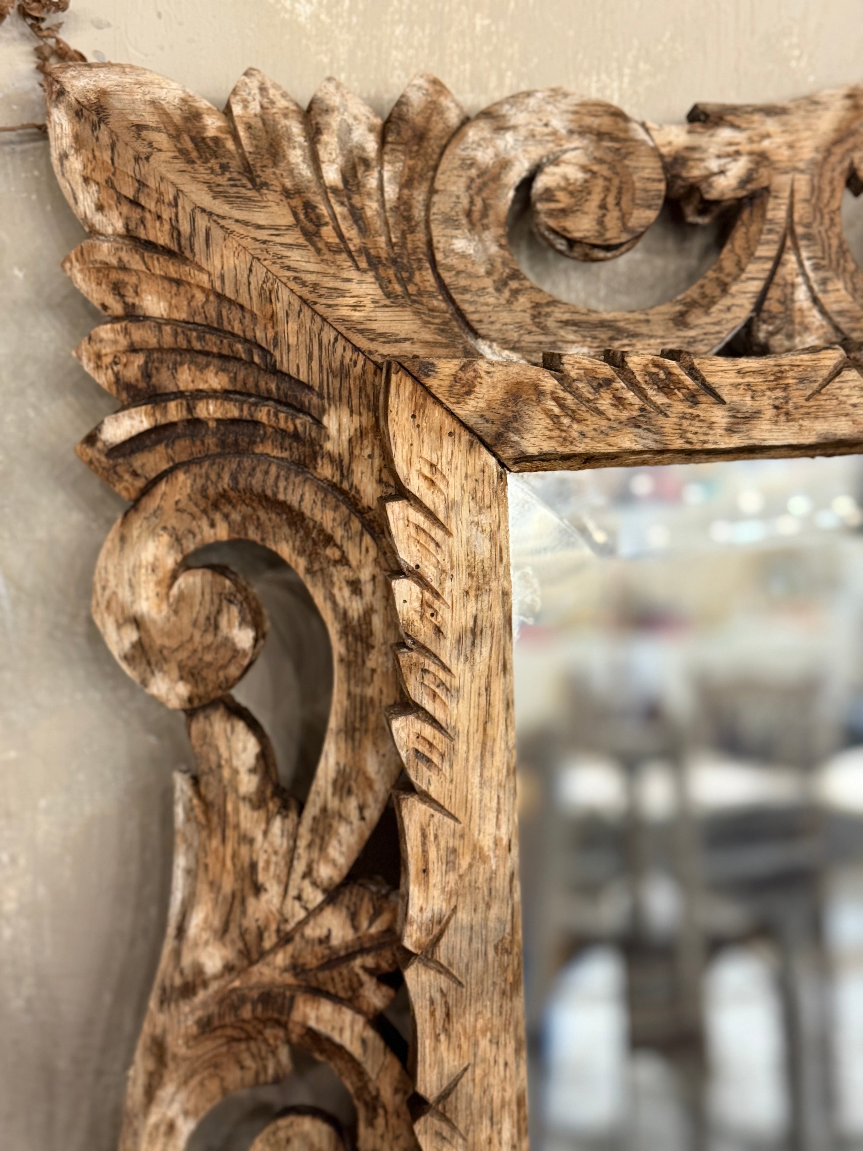 Carved oak mirror