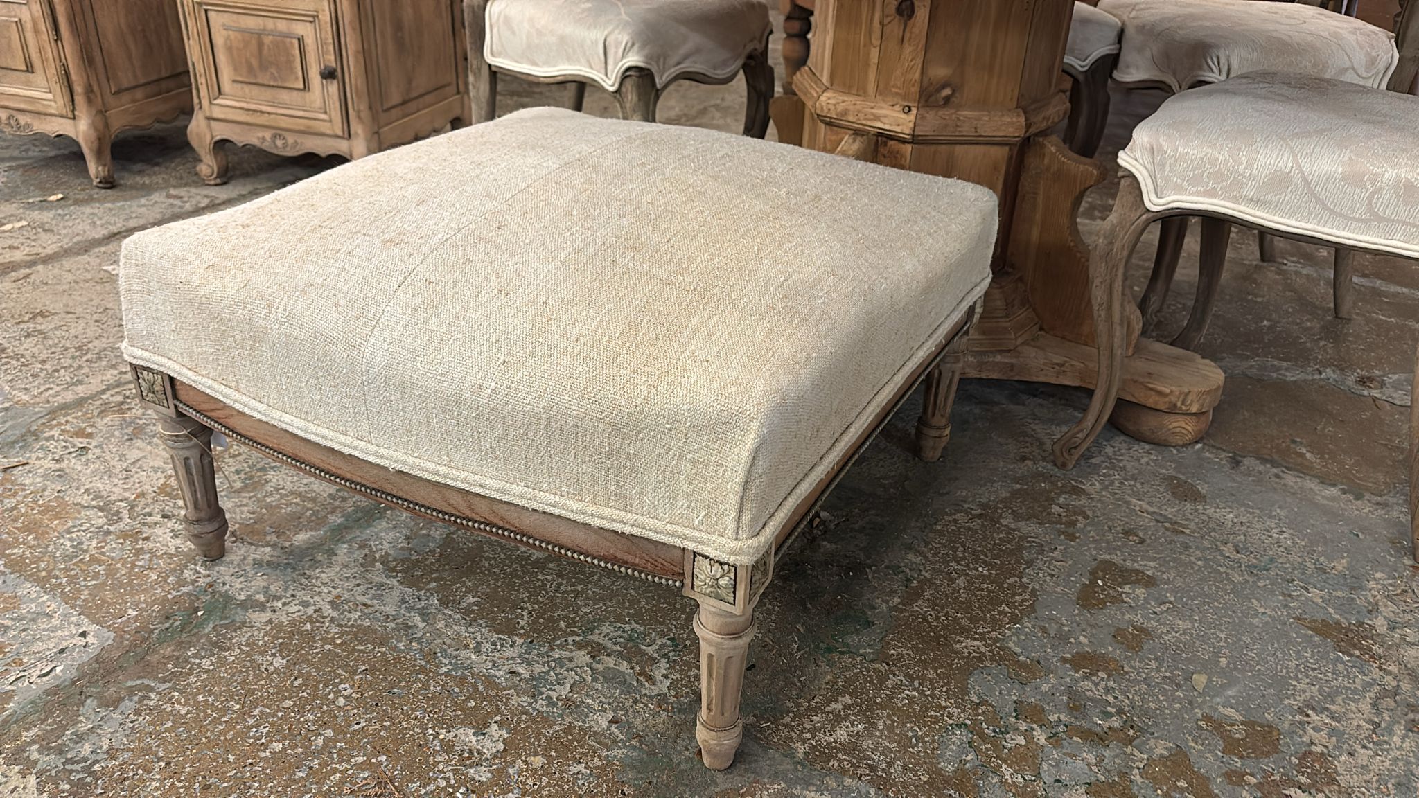 Linen covered footstool