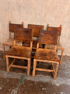 Set of five vintage leather and oak dining chairs