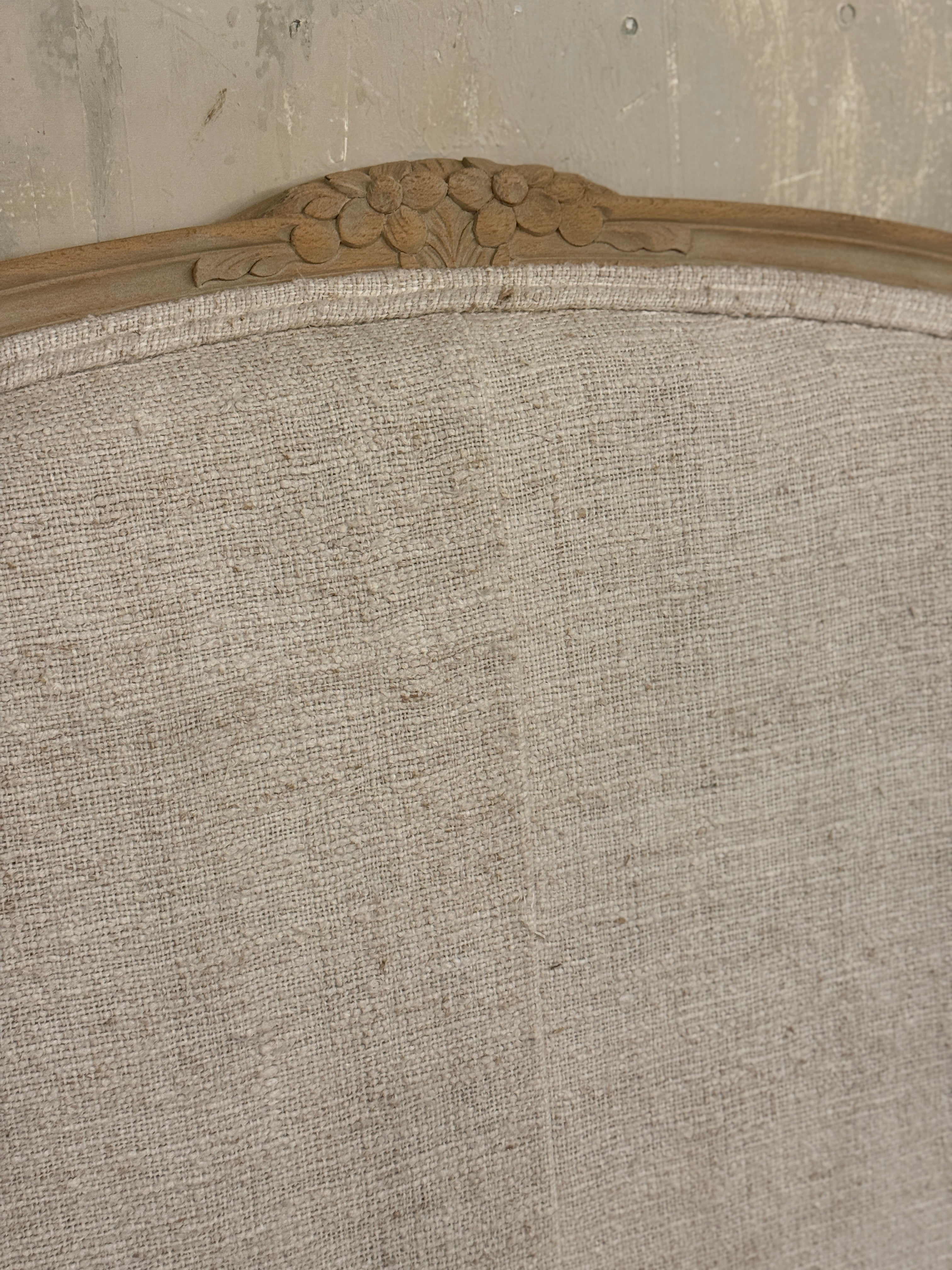 French linen covered king size bed