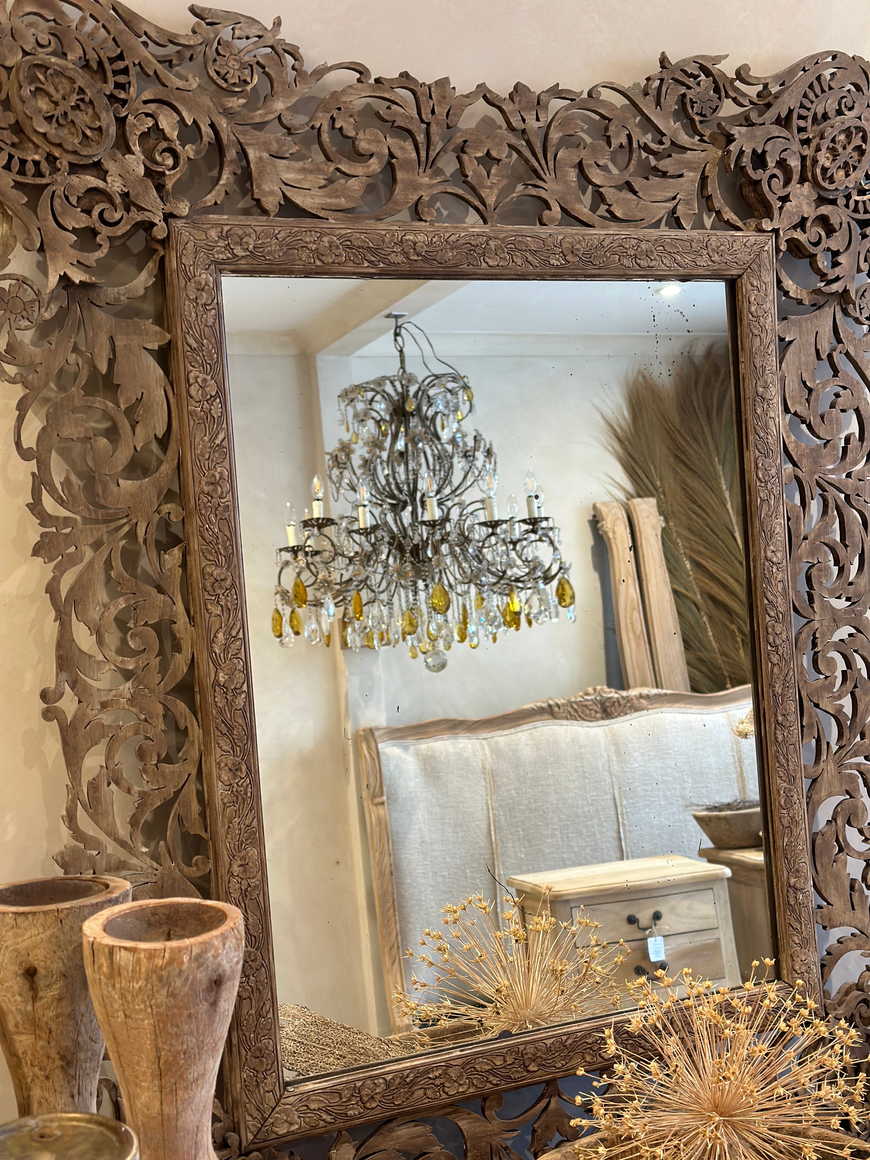 Intricate carved mirror