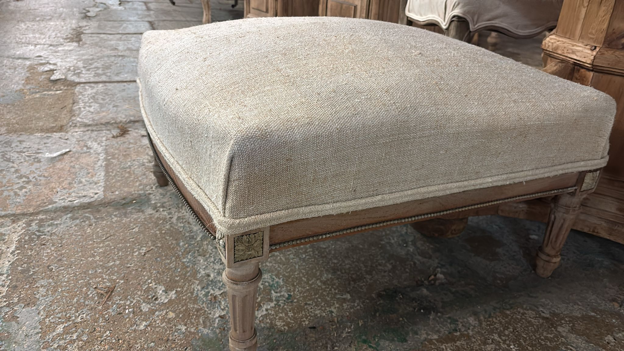 Linen covered footstool