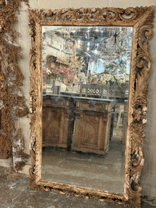 Carved oak mirror