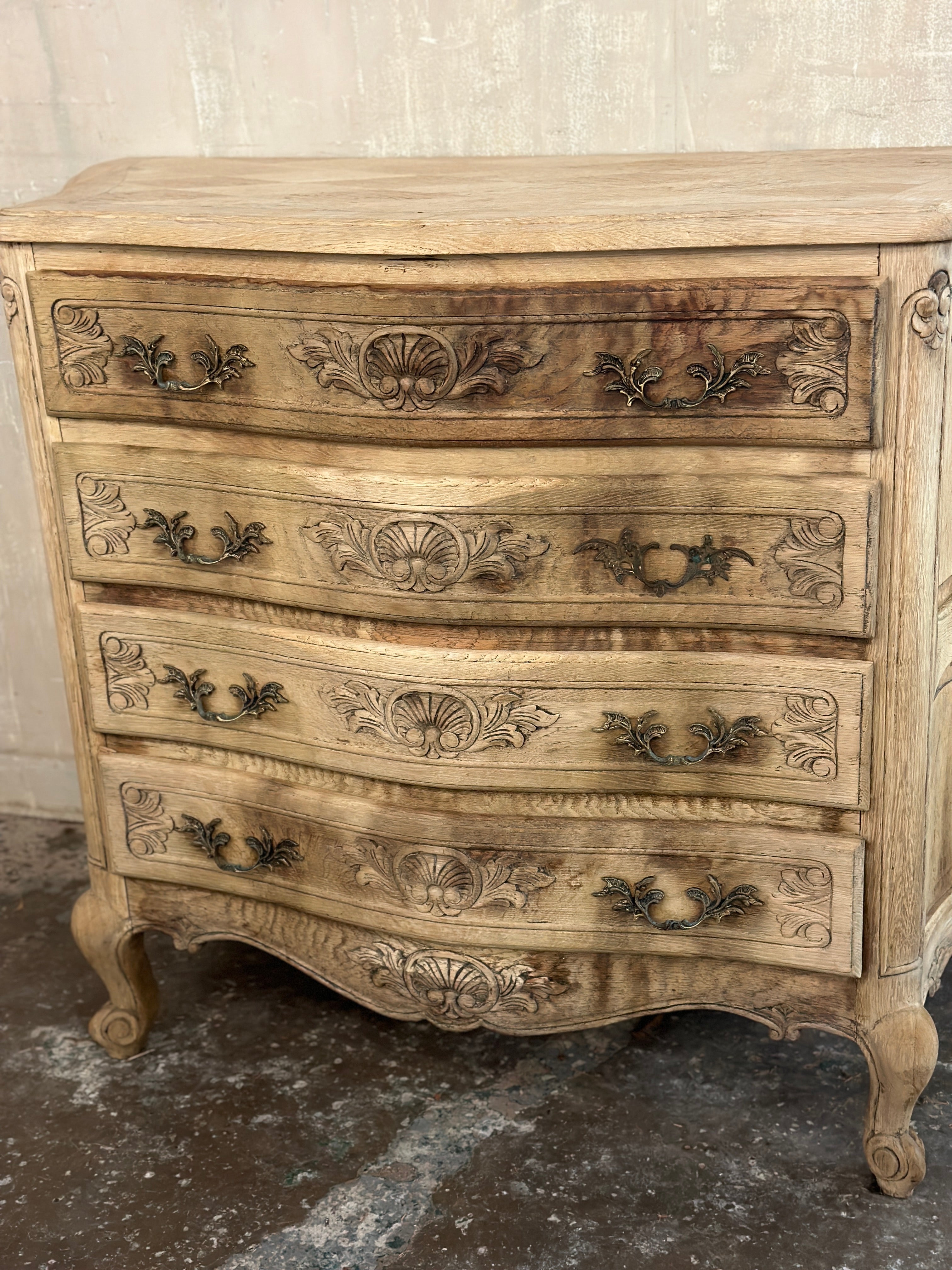 French serpentine chest of drawers