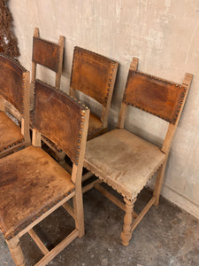 Set of five vintage leather and oak dining chairs