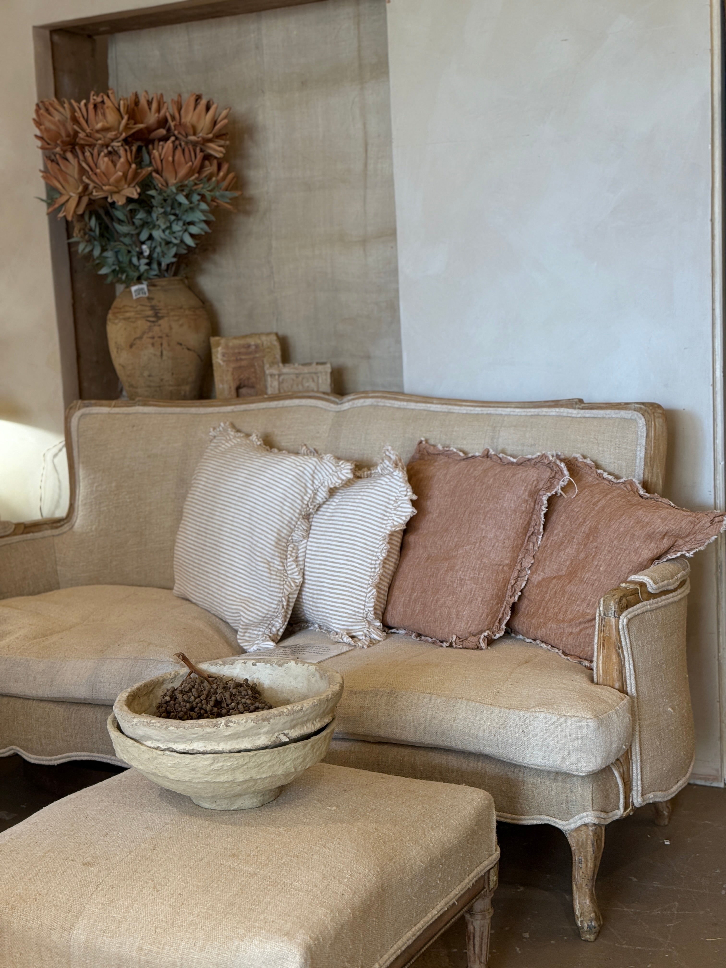Linen covered settee
