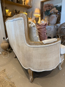 Linen covered settee