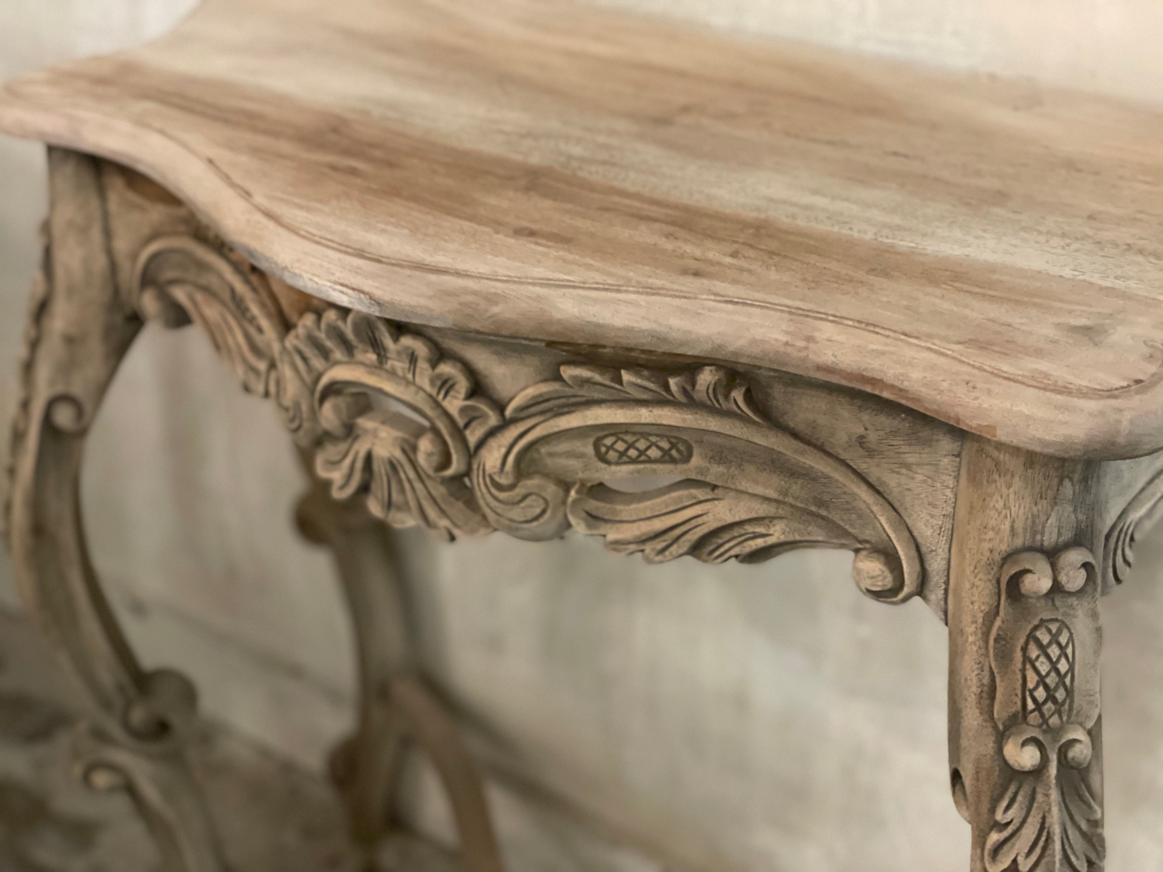 Carved console table